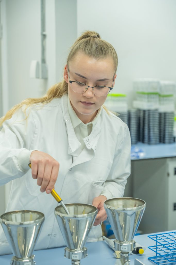 Images depicts a scientist working in one of ADEY's laboratories in Kent Science Park.