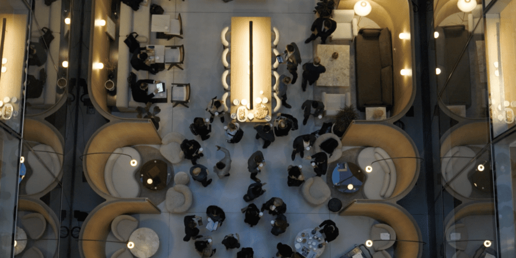 Life sciences funding: a bird's eye shot of a group of a large group of people enjoying an evening at an investment fundraiser