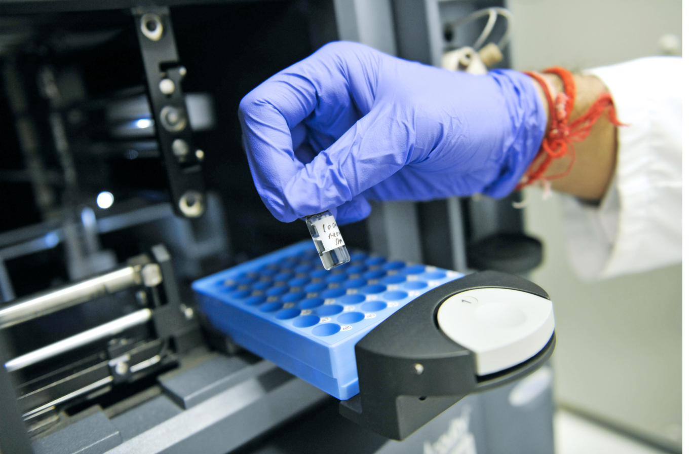 Investors · inv-001.jpg Scientist working in a shared laboratory